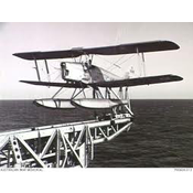 The Queen Bee (UK), the first returnable and reusable UAV, was designed for use as an aerial target during training missions. The spruce-and-plywood biplanes first flew in 1935 and bore wheels or floats. The Queen Bee was radio-controlled and could fly as high as 17,000 feet and travel a maximum distance of 300 miles at over 100 mph. A total of 380 Queen Bees served as target drones in the Royal Air Force and the Royal Navy until they were retired in 1947. 